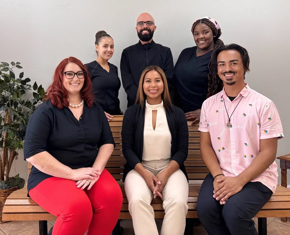 The Grand Central Smiles team with Dr. Alexis del Rosario in the center.